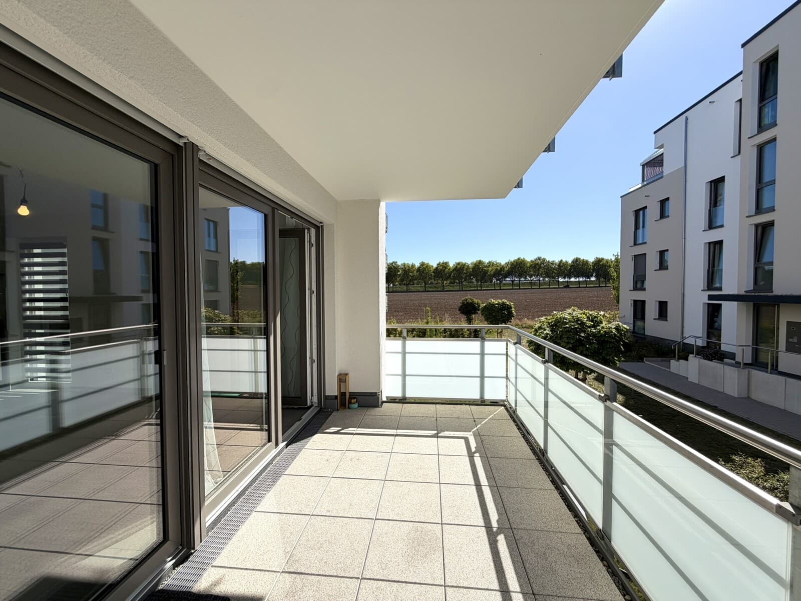3,5-Zimmer-Neubauwohnung mit Balkon, TG-Stellplatz & moderner Einbauküche